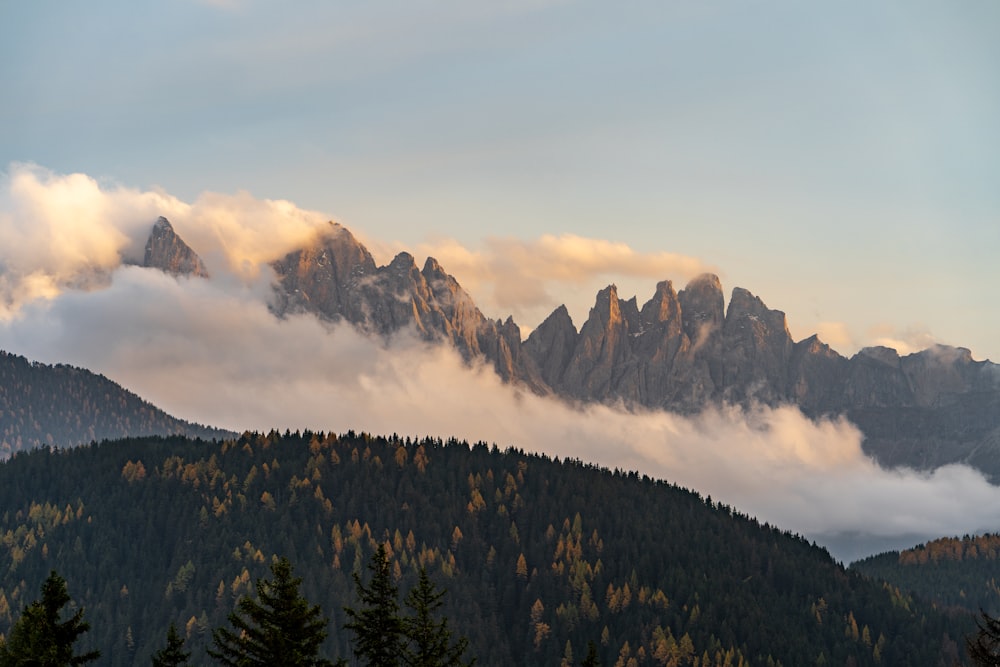 a mountain range with clouds