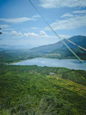 Aerial shot of the expansive Bauer Lakes reservoir surrounded by lush greenery.