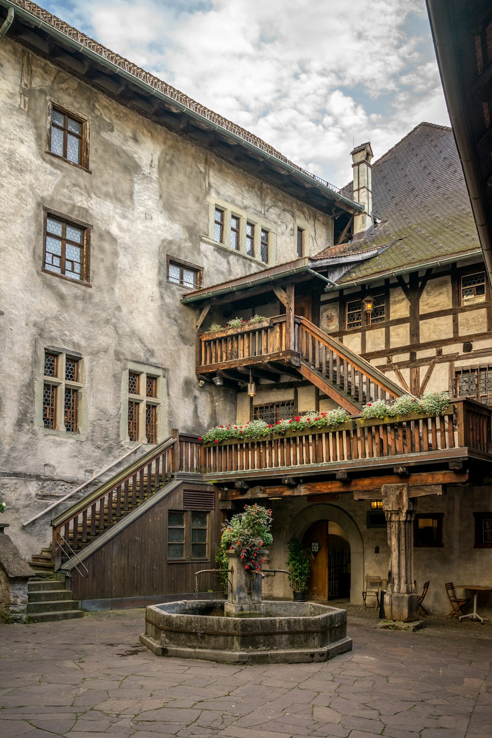 a building with a fountain in front