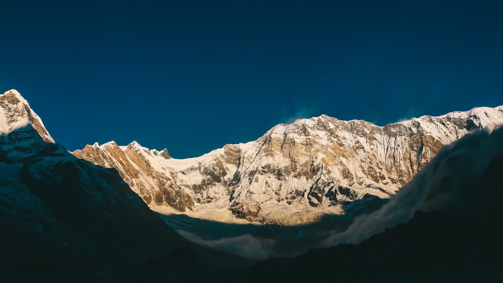 a mountain with snow