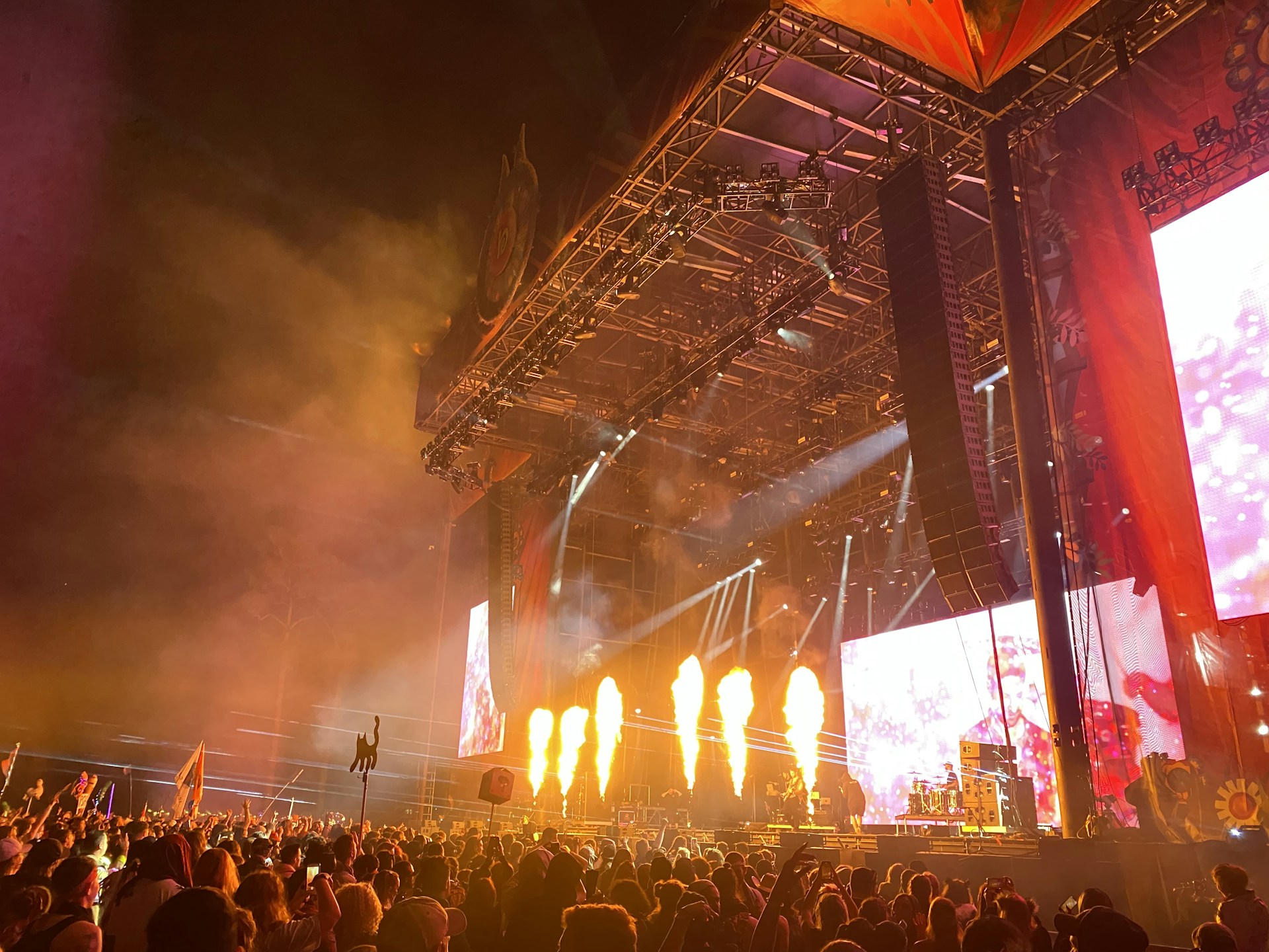 woman wearing yellow long-sleeved dress under white clouds and blue sky during daytime