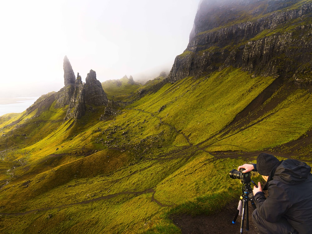 a person riding a bike on a mountain