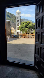 A welcoming view of Utica's main street with town hall and community bulletin board.