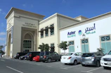 a building with cars parked in front