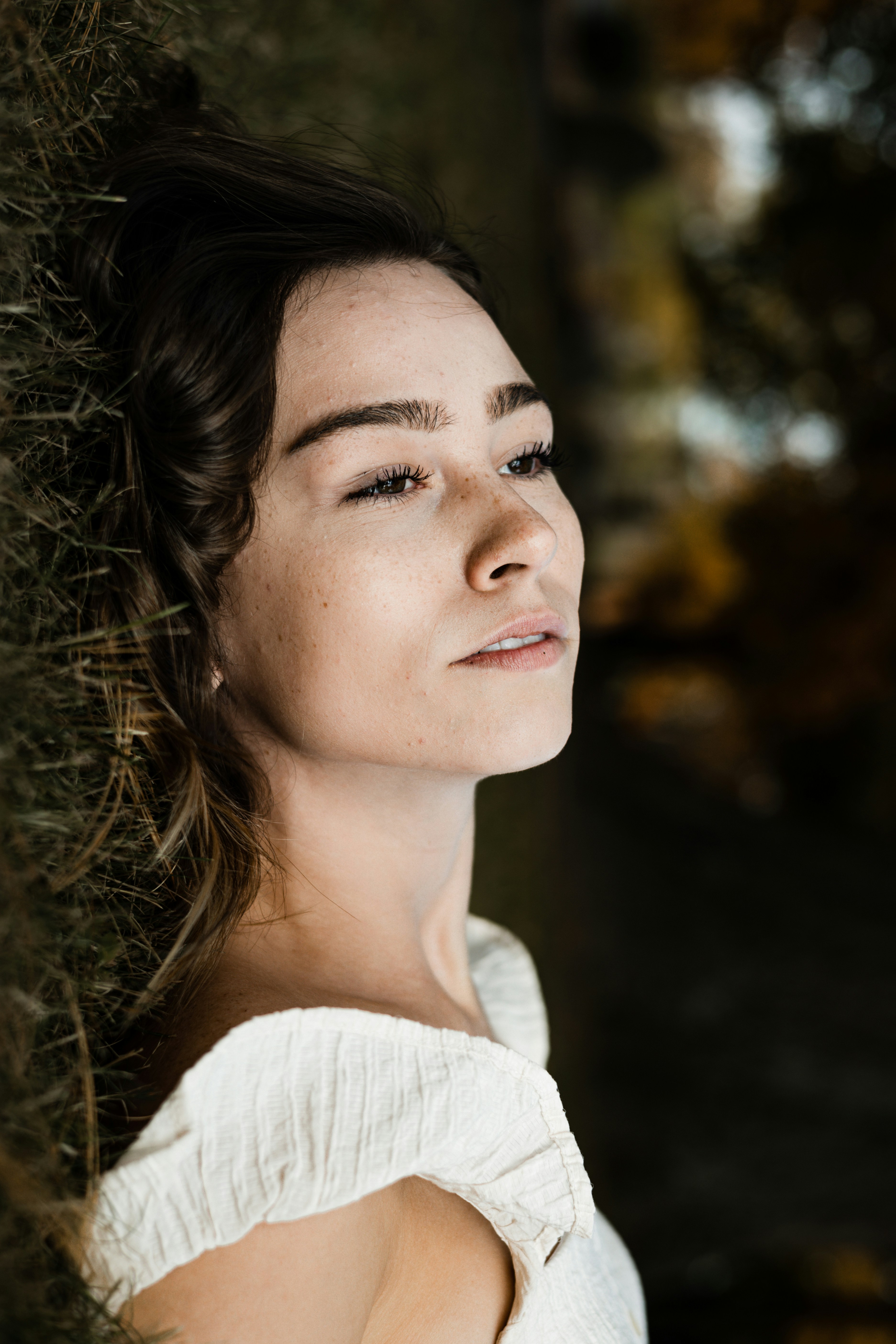 a person with the hair pulled back