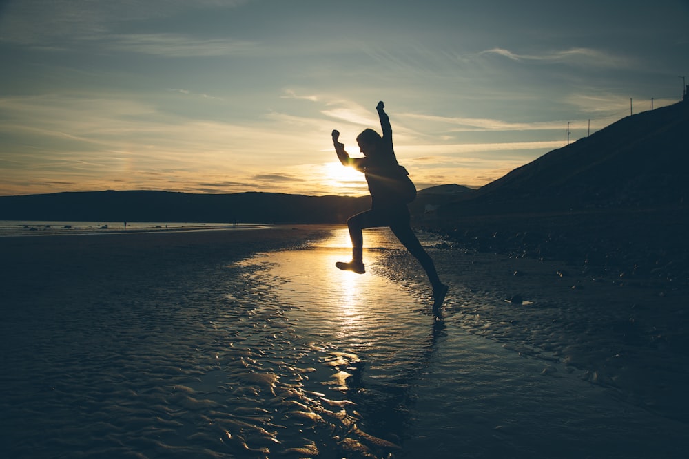 a person jumping into the water