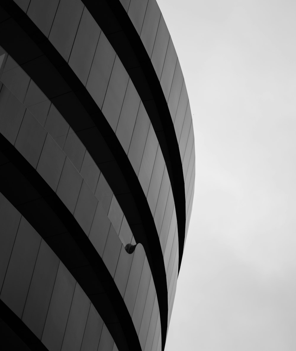 a tall building with a glass wall