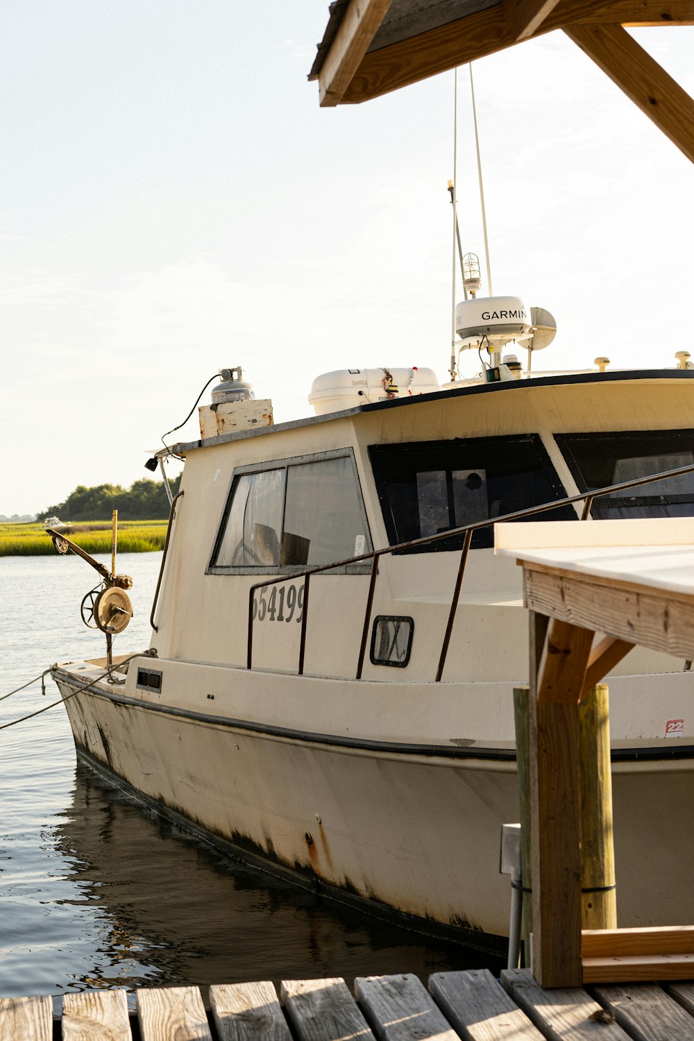 a boat docked at a pier