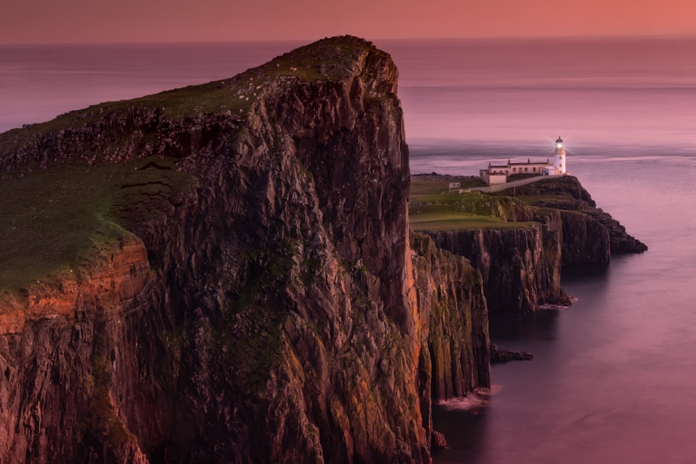 a lighthouse on a cliff