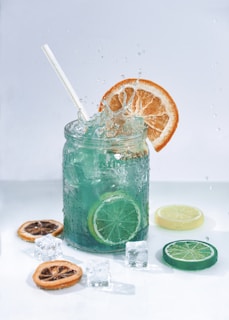 Refreshing beetroot and apple juice in a mason jar with a slice of lemon