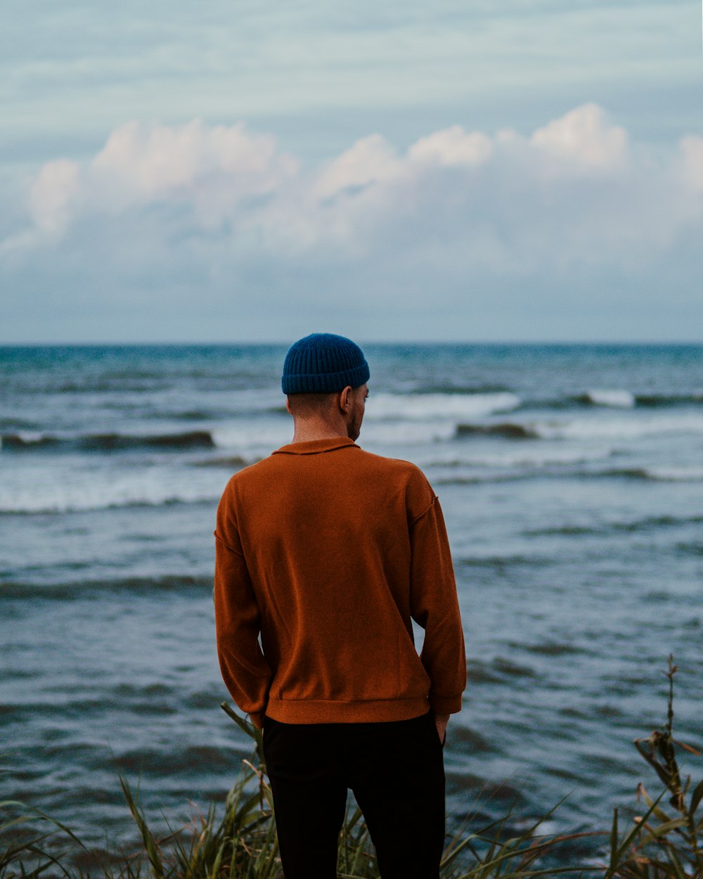 a man standing on a beach