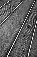 Railway track with measurement devices installed for inspection.