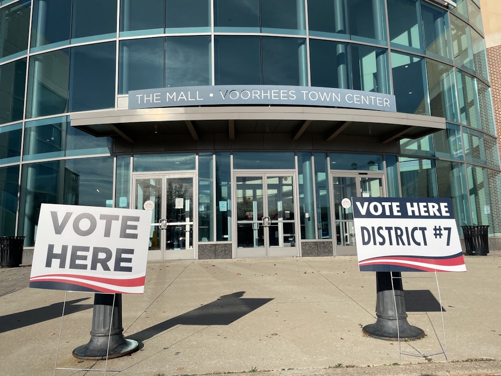 a few signs in front of a building