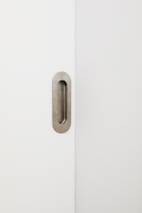 A bright, modern door displayed against a clean, white background highlighting its design.
