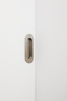 A bright, modern door displayed against a clean, white background highlighting its design.