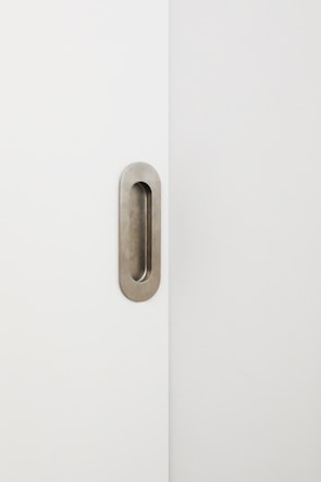 An interior door featuring a minimalist style.