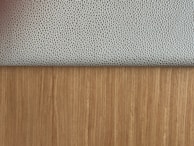 Close-up of innovative fabric textures combining smooth and rough surfaces.