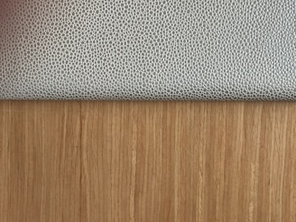 Close-up of innovative fabric textures combining smooth and rough surfaces.
