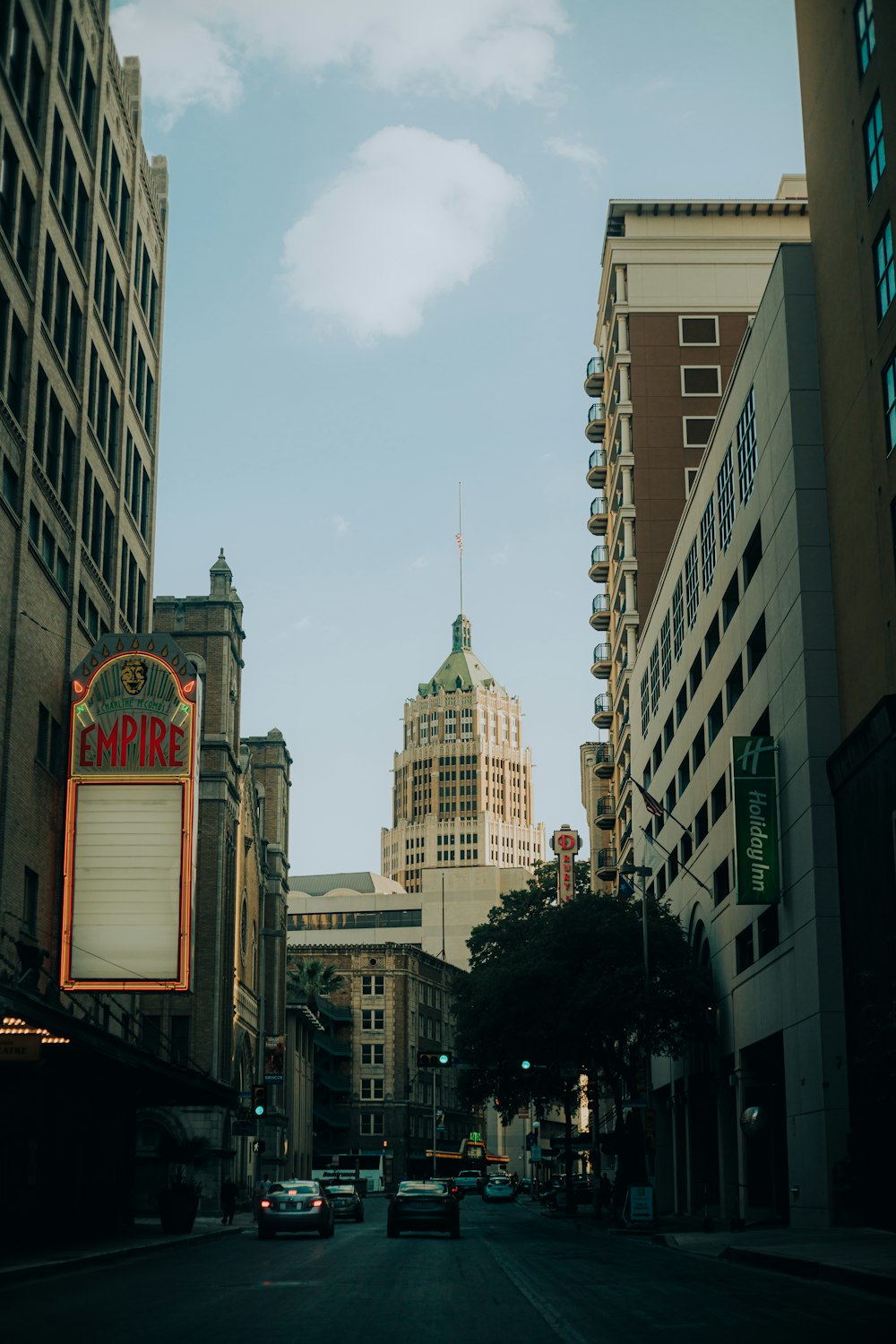 a city street with tall buildings