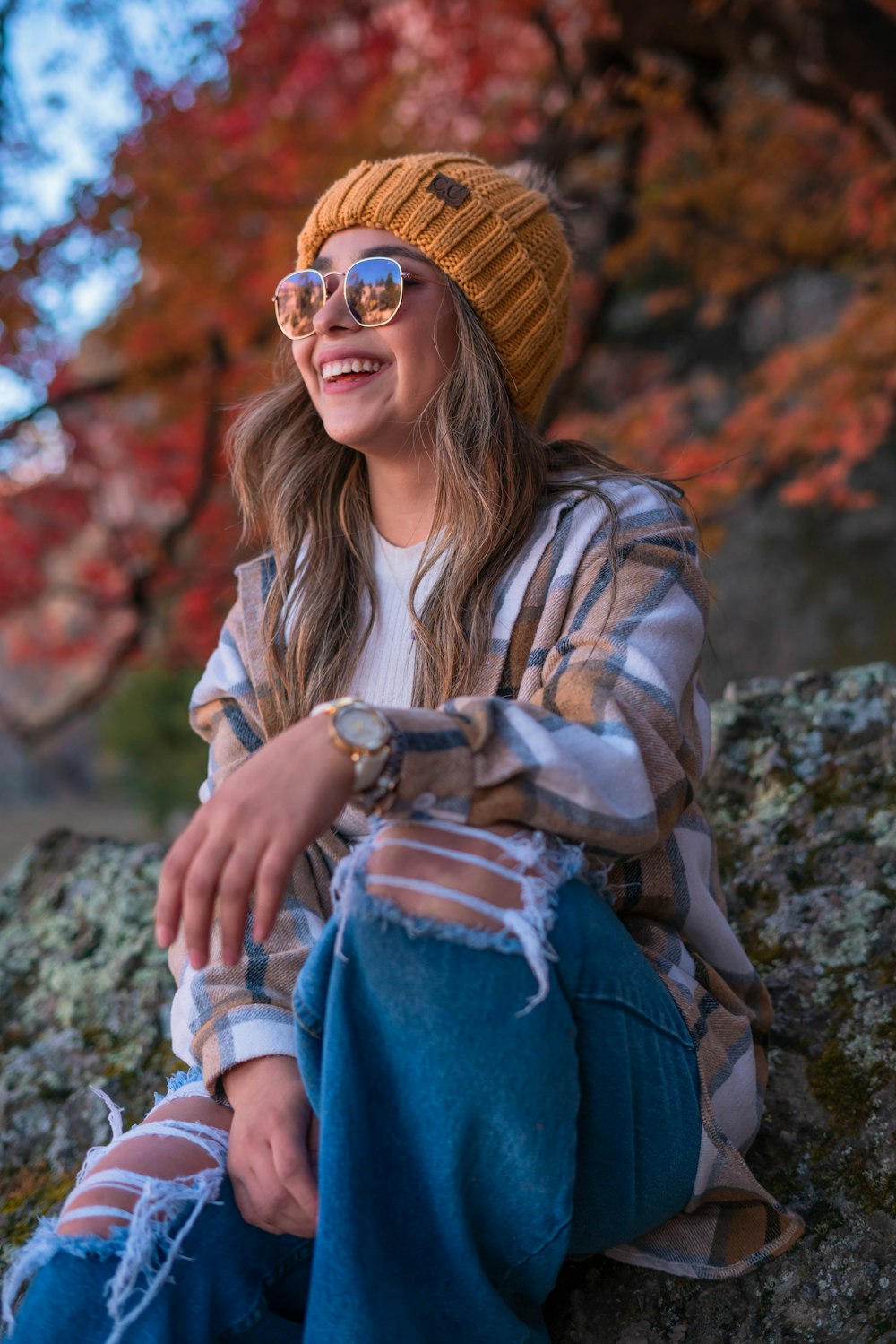 a person sitting on a rock