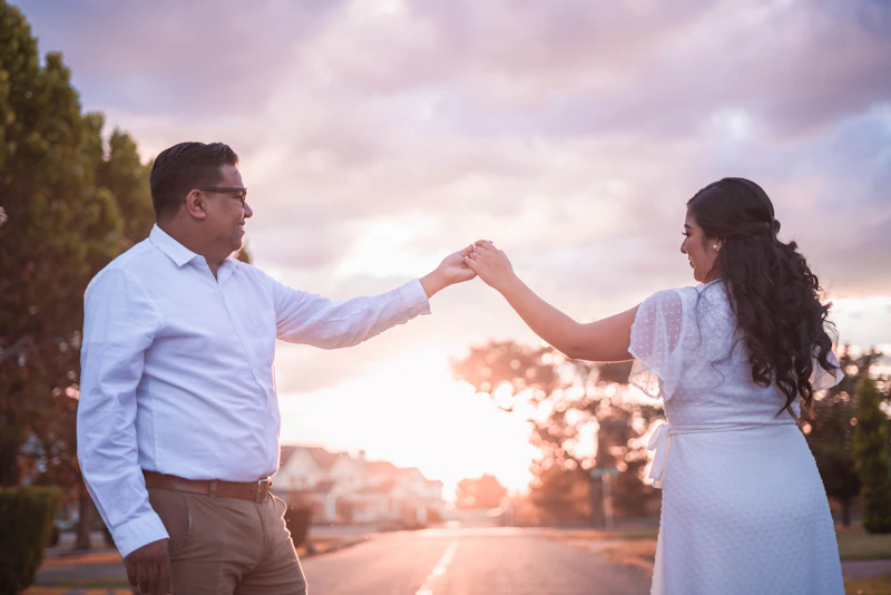 man and woman holding hands with ease