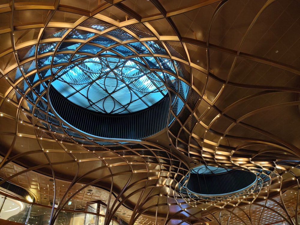 a large glass ceiling with a circular window