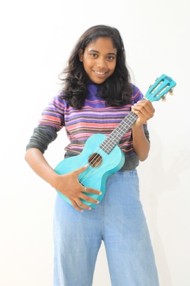 a person holding a guitar