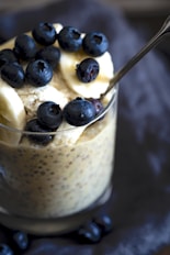 a bowl of cereal with blueberries