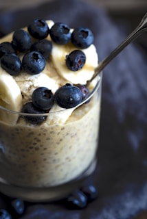 a bowl of cereal with blueberries