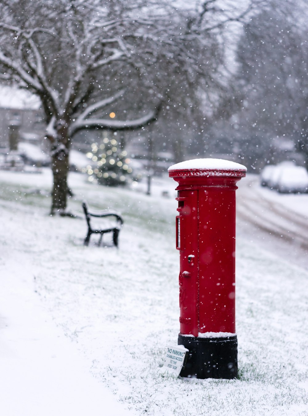 a red fire hydrant in the snow