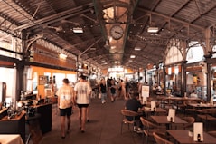 people walking in a large room