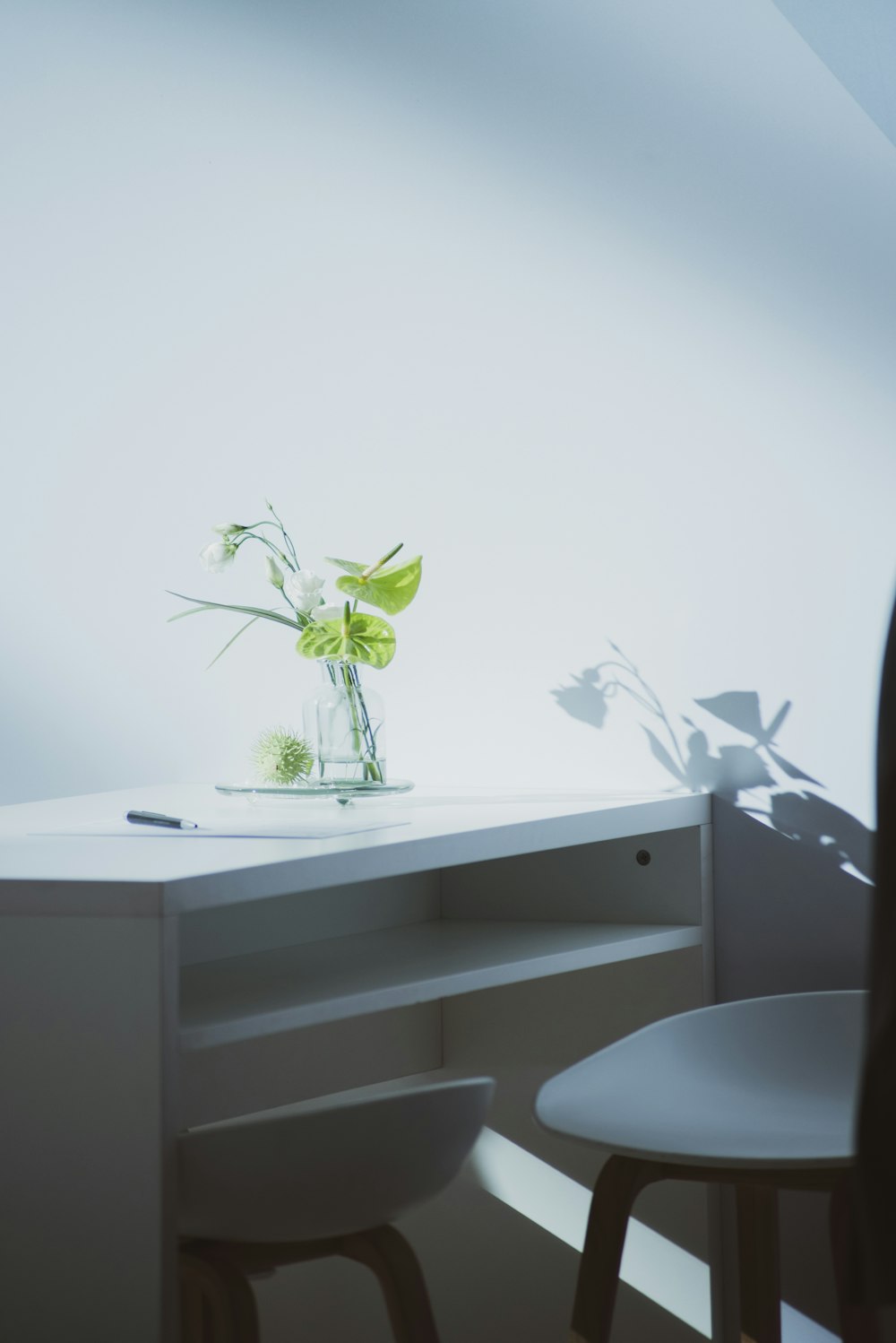 a table with a vase of flowers