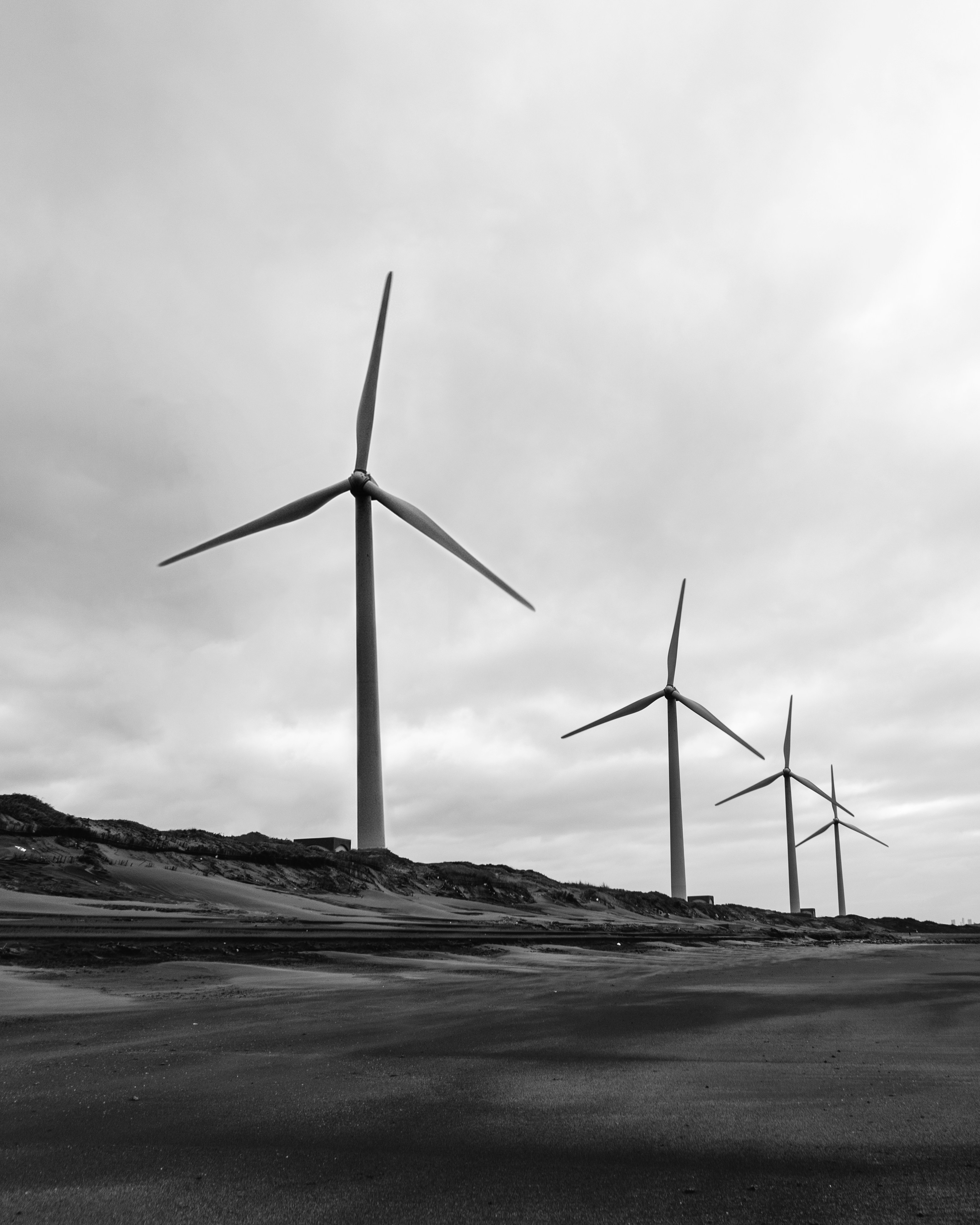 a group of wind turbines
