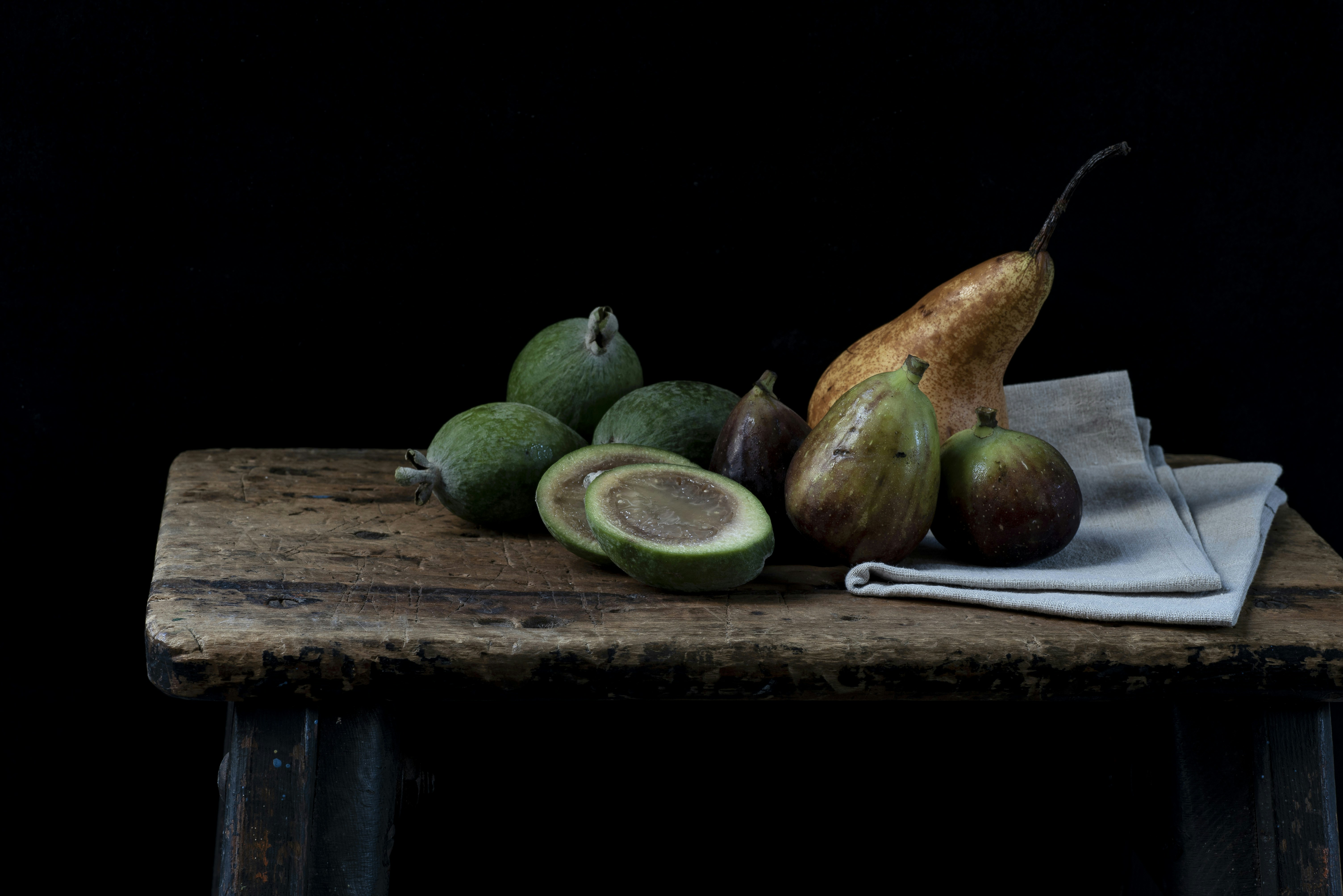 a group of fruit on a table
