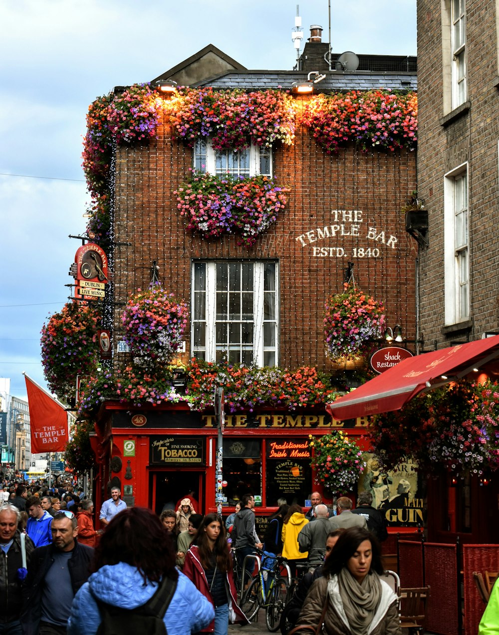 a building with many flowers on it