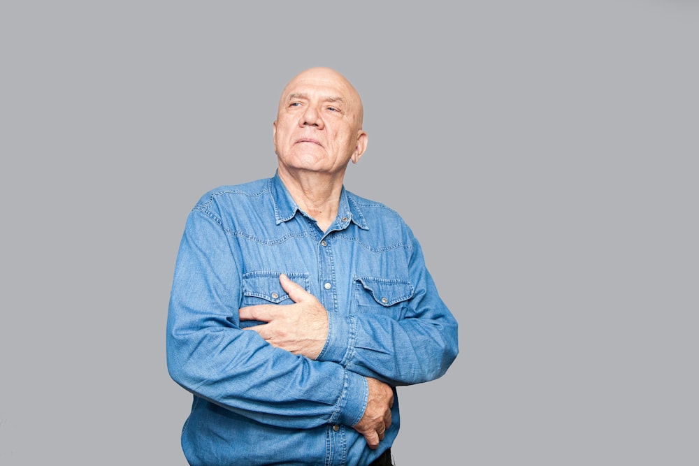 a man in a blue shirt