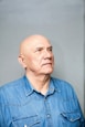 a man in a blue shirt
