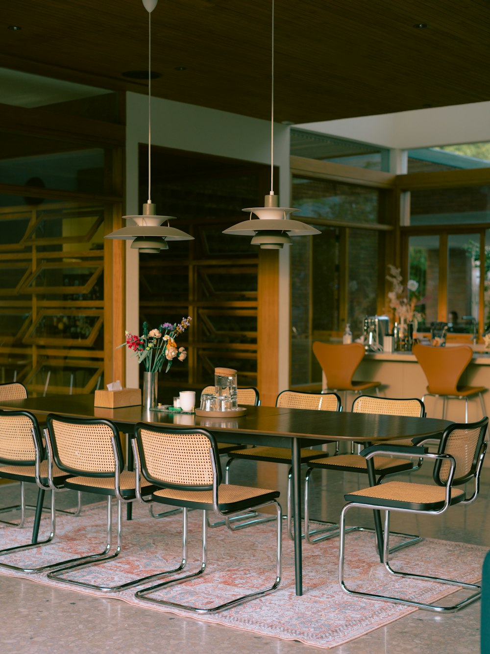 a room with a table and chairs