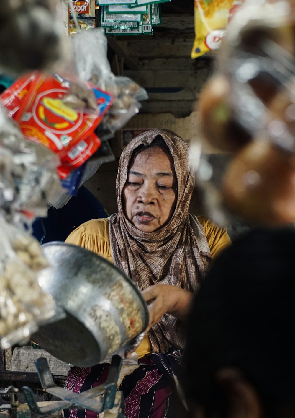 a person wearing a head scarf