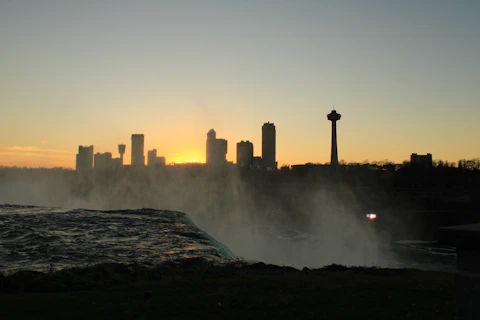 a city skyline with fog