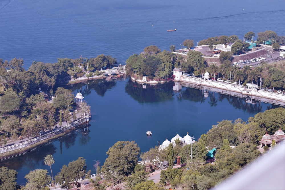 a body of water with a bridge and buildings along it