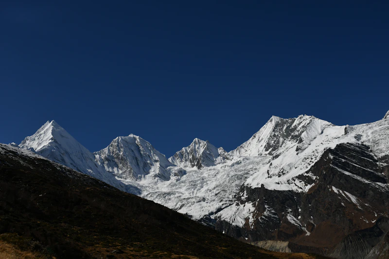 Snowy mountain range in Darma Valley
