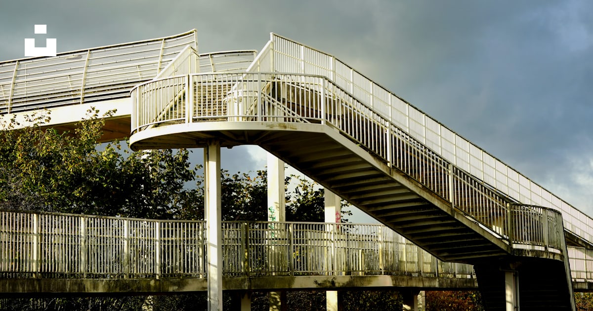 A bridge with a railing photo – Free Overpass Image on Unsplash