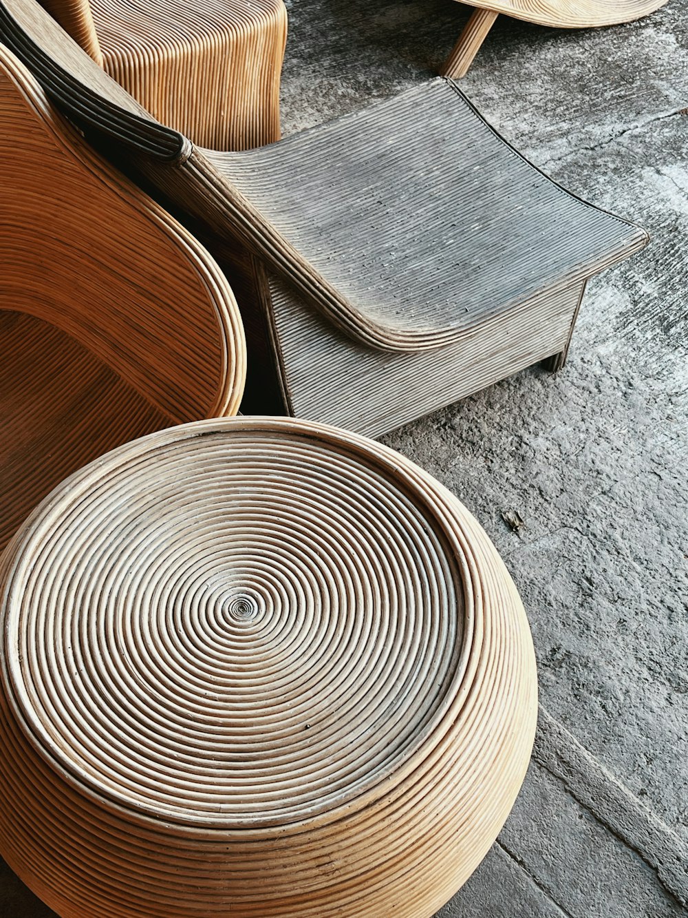 a wooden wheel on a wooden surface