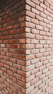 a brick wall with a hole in it