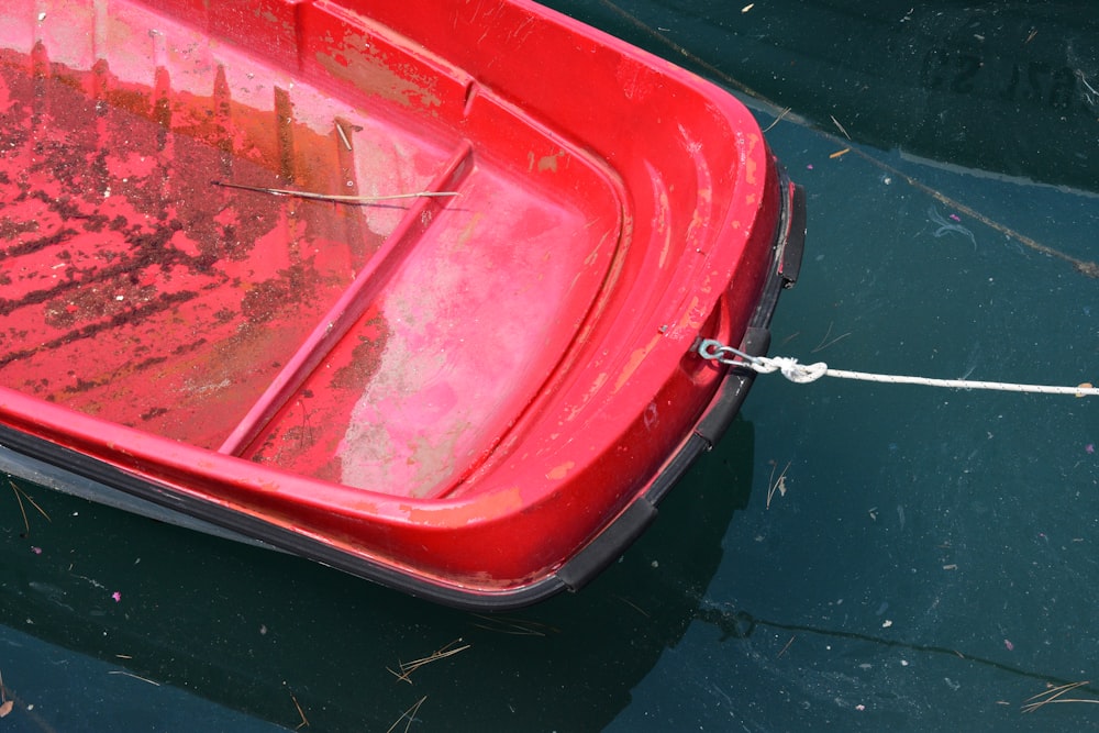 a red car with a rope