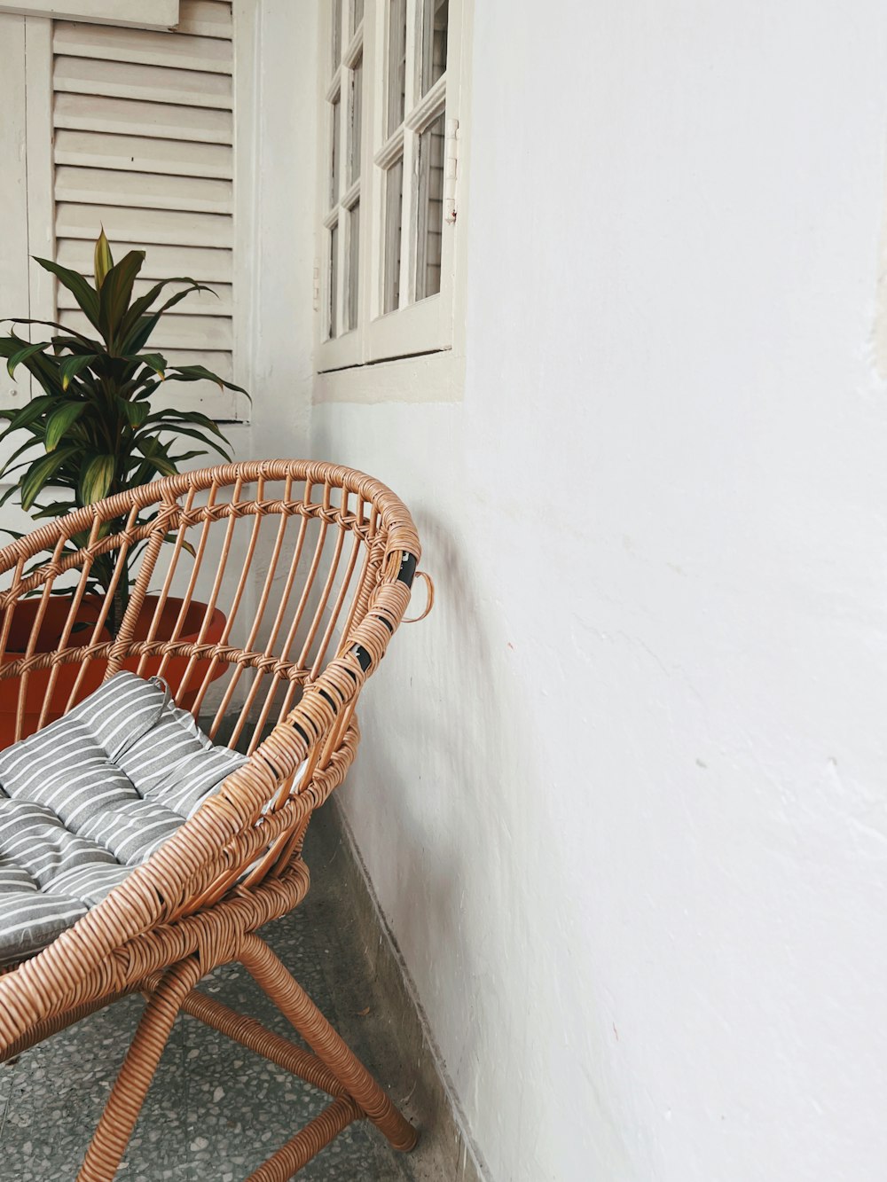 a chair in front of a window