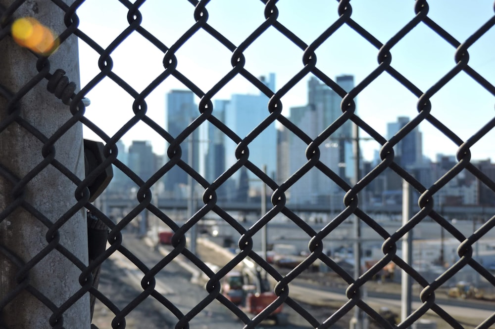 a metal fence with a metal gate