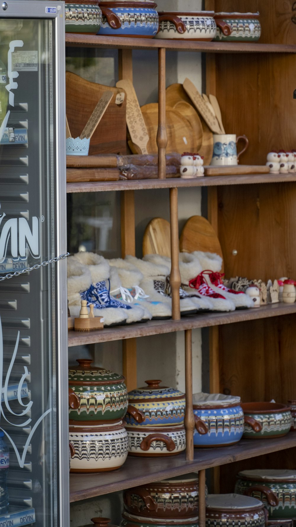 a shelf with many objects on it