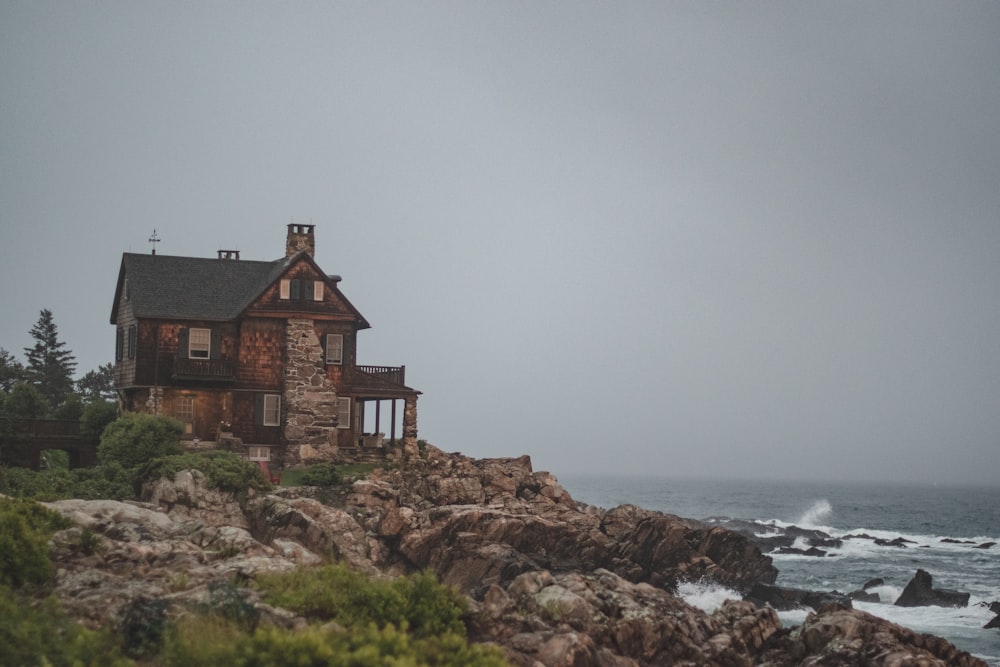 a house on a rocky shore